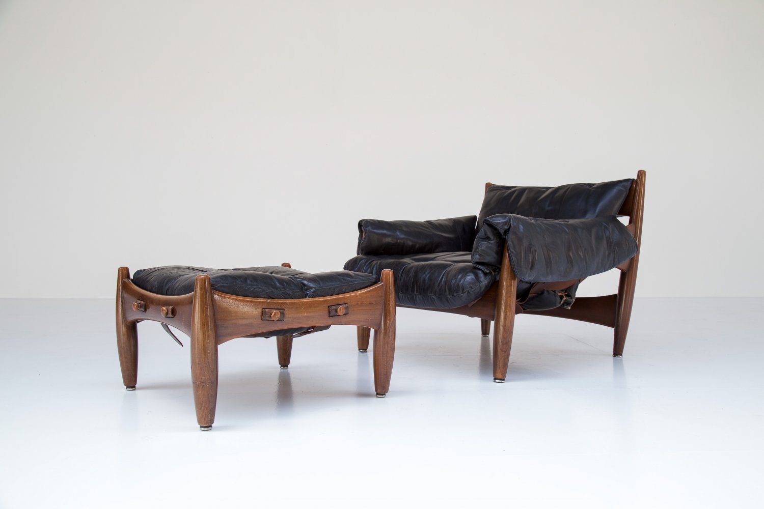 Sergio Rodrigues 'Sheriff' chair and ottoman.