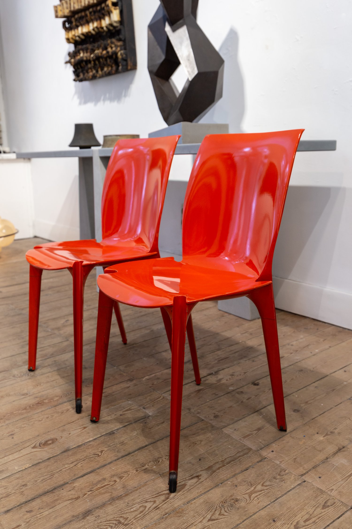 Pair of red 'Lambda' chairs by Marco Zanuso & Richard Sapper