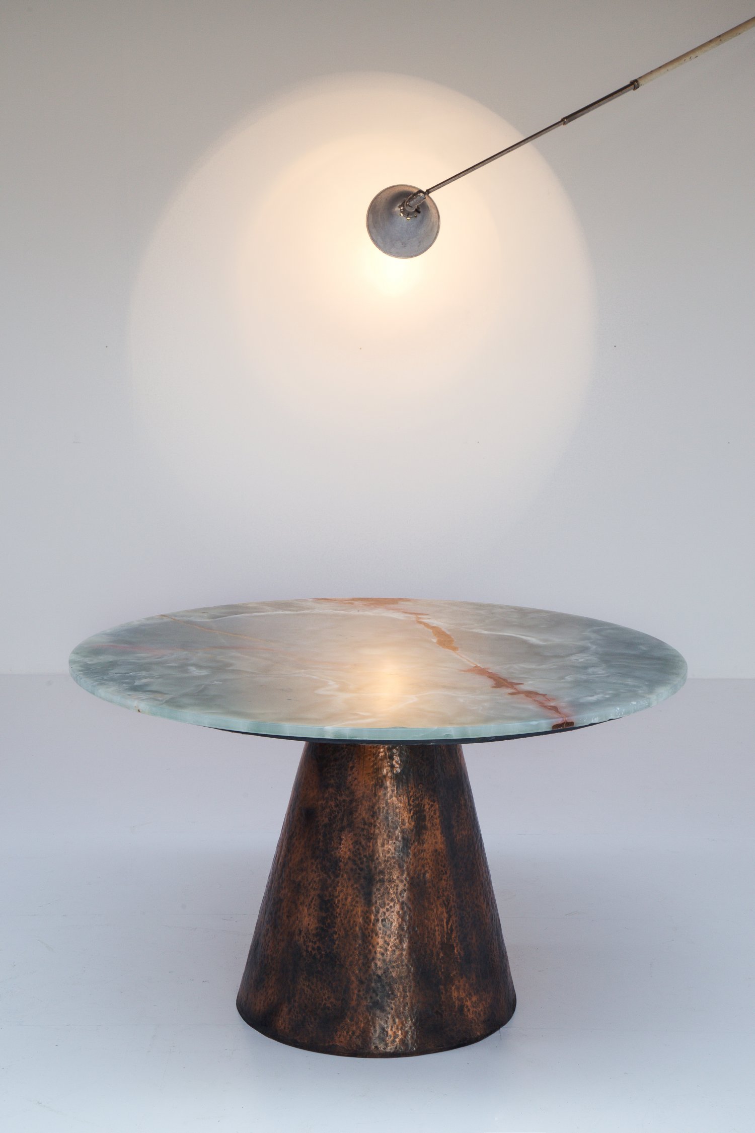 Copper and onyx dining table.