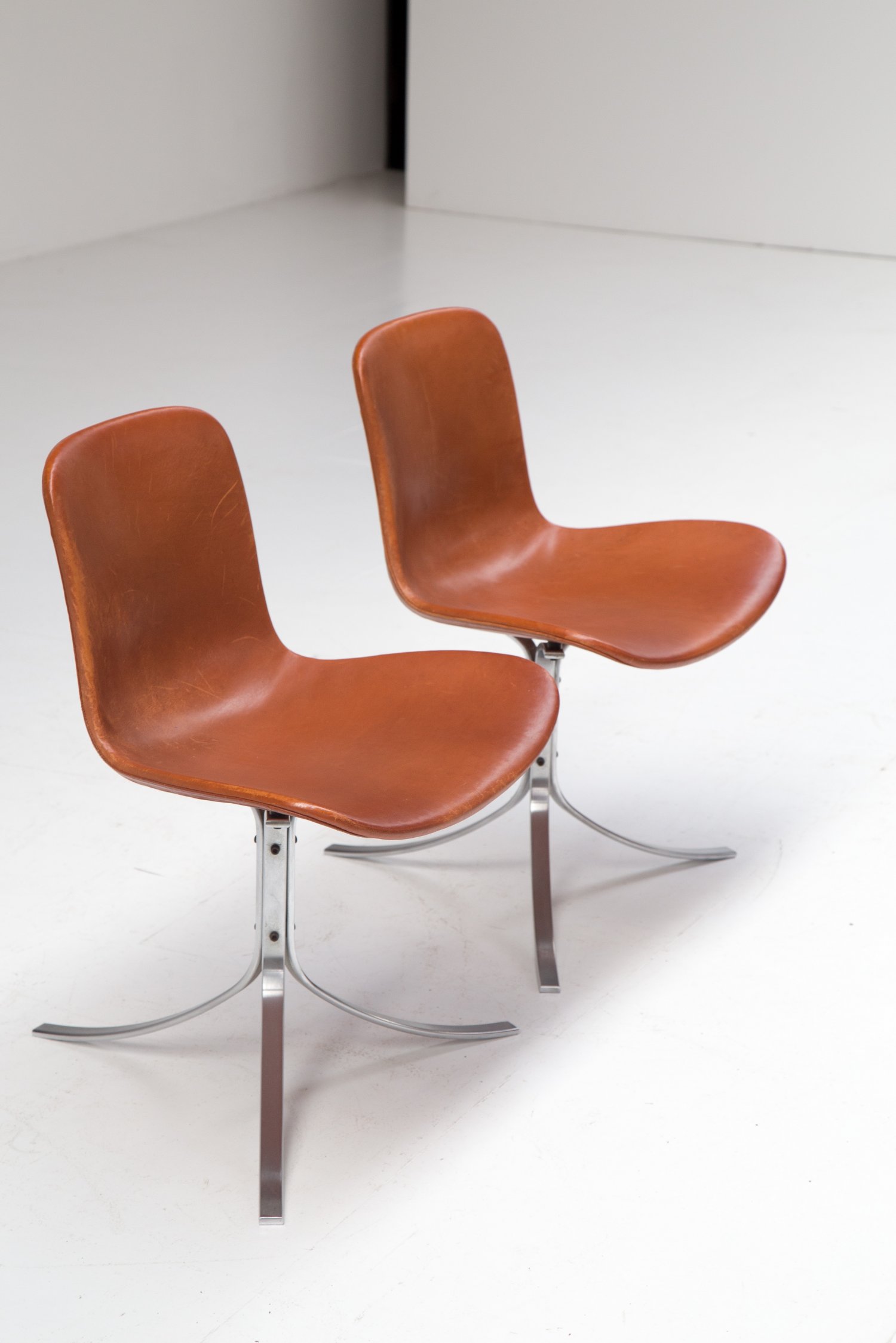 Pair of PK9 chairs by Poul Kjaerholm