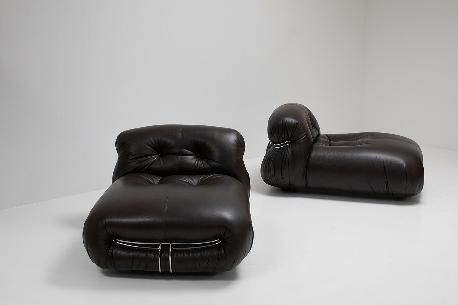 Pair of dark brown leather Soriano lounge chairs