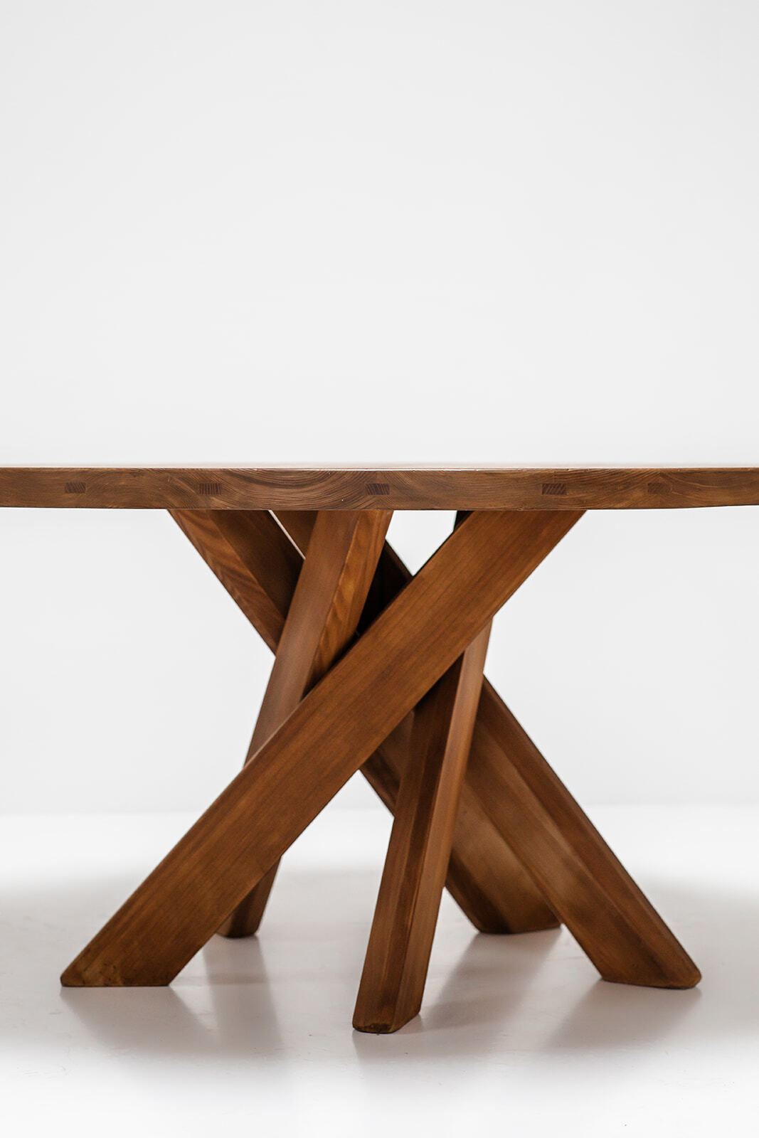 Round dining table by Pierre Chapo